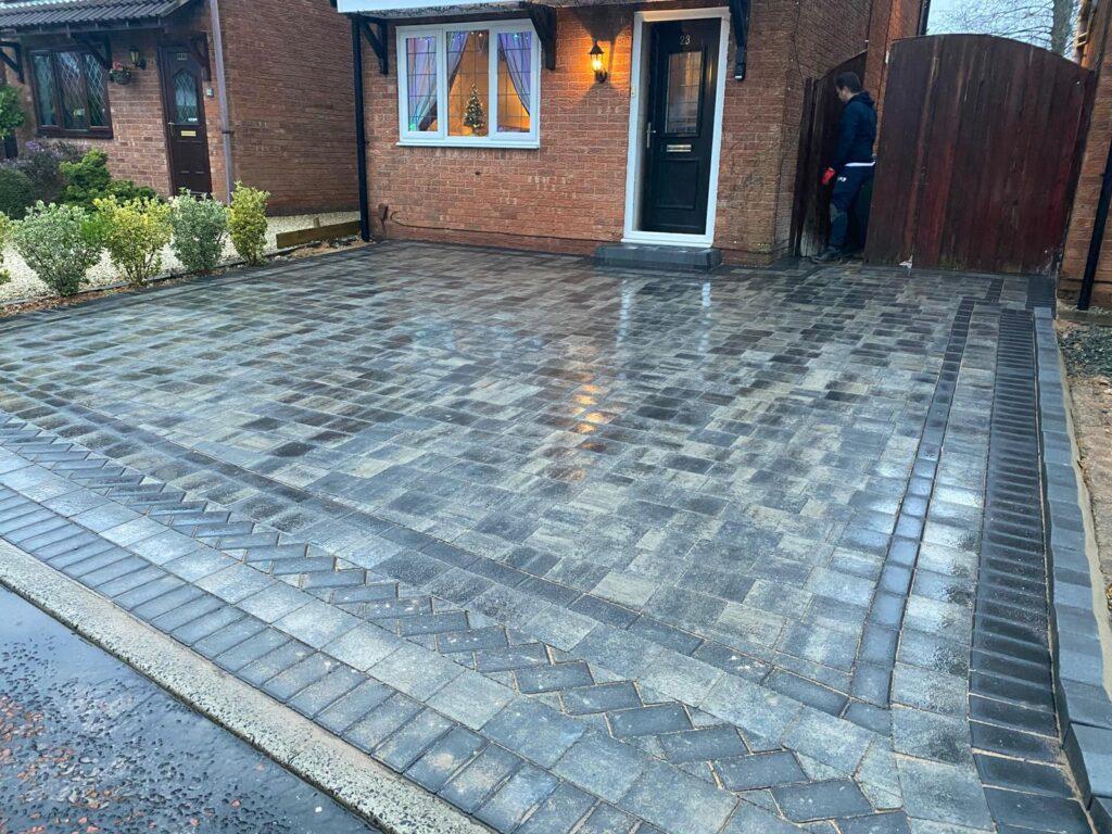 dark block paving with charcoal border